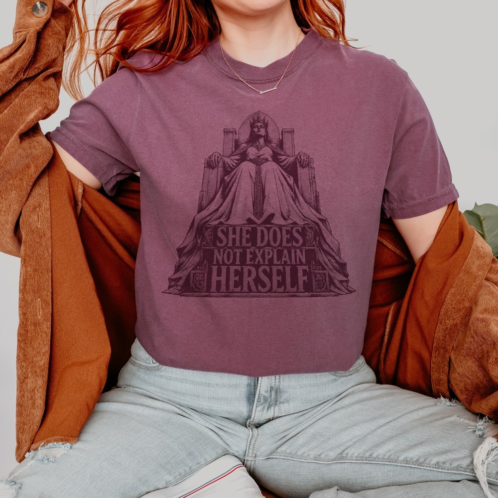 She Does Not Explain Herself Queen on Stone Throne Tee